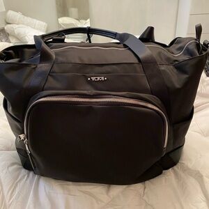 Tumi Black Duffel Bag with Silver Accents